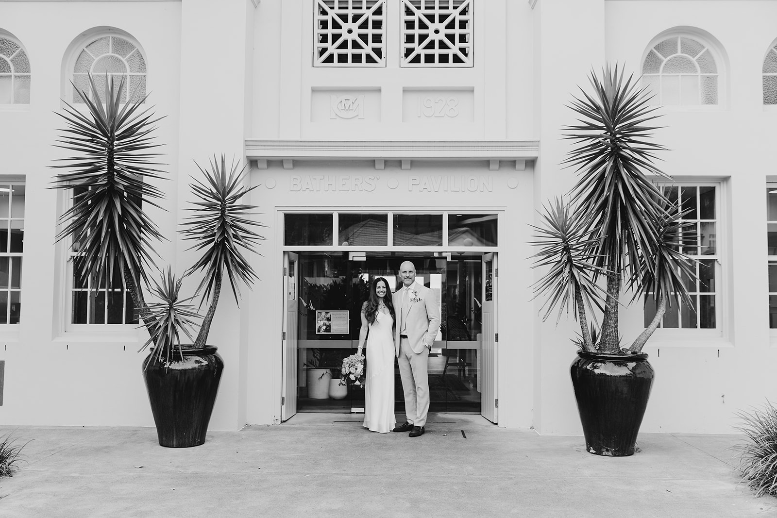 bride and groom out the front of bather pavilion
